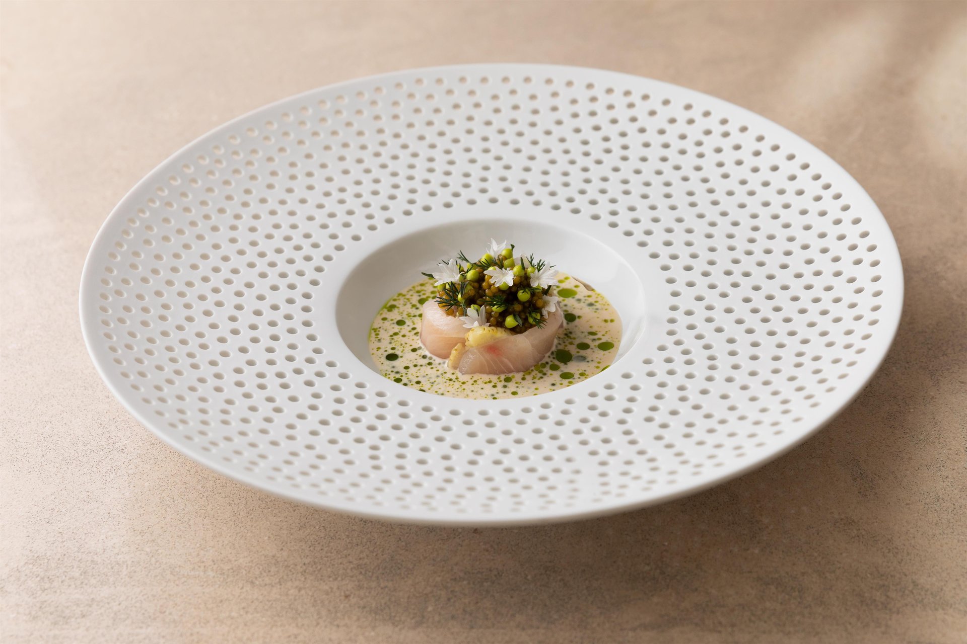 An elegantly presented gourmet dish at Lorenz Adlon Esszimmer