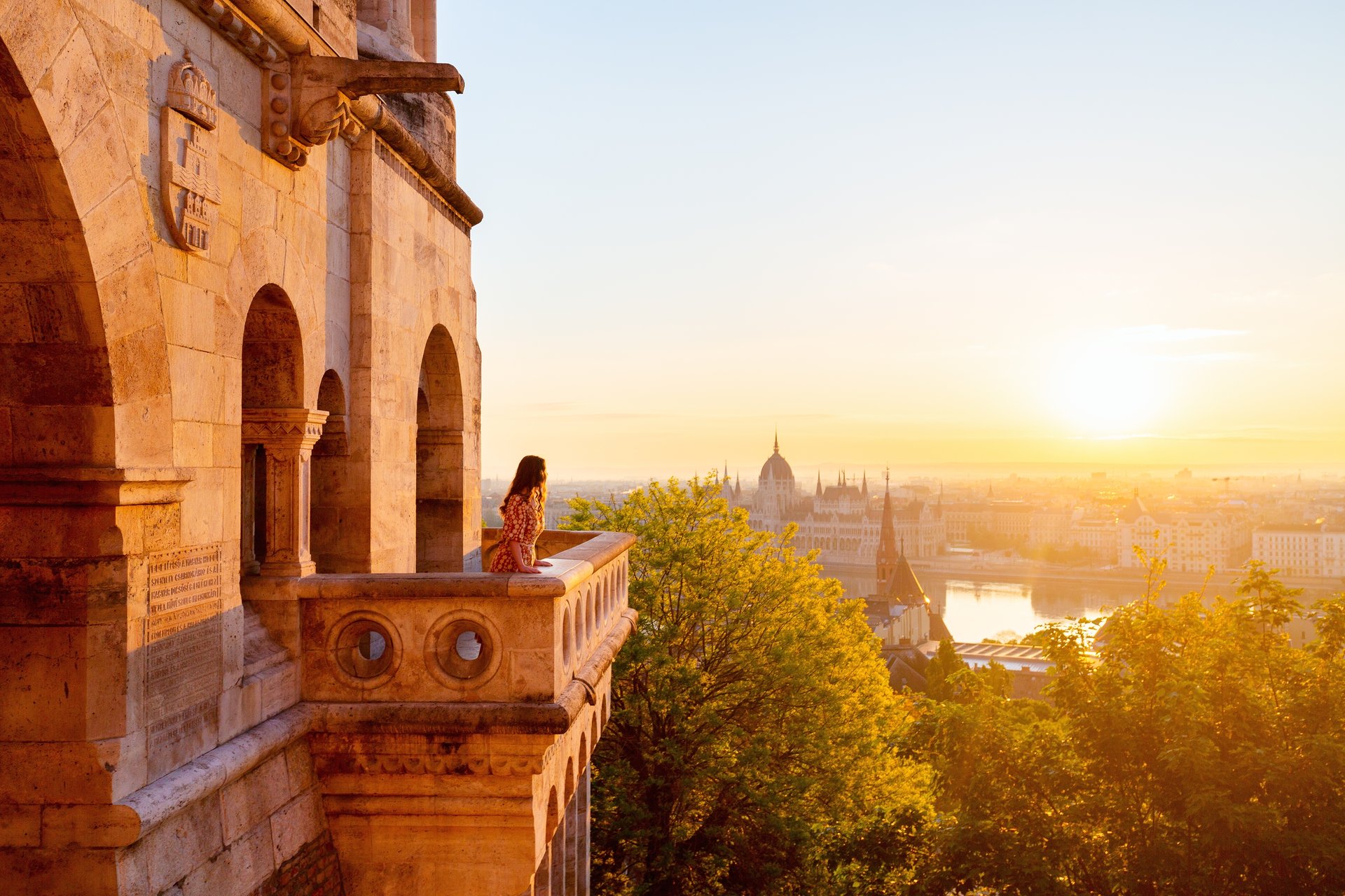 Woman overlooking Budapest Parliament