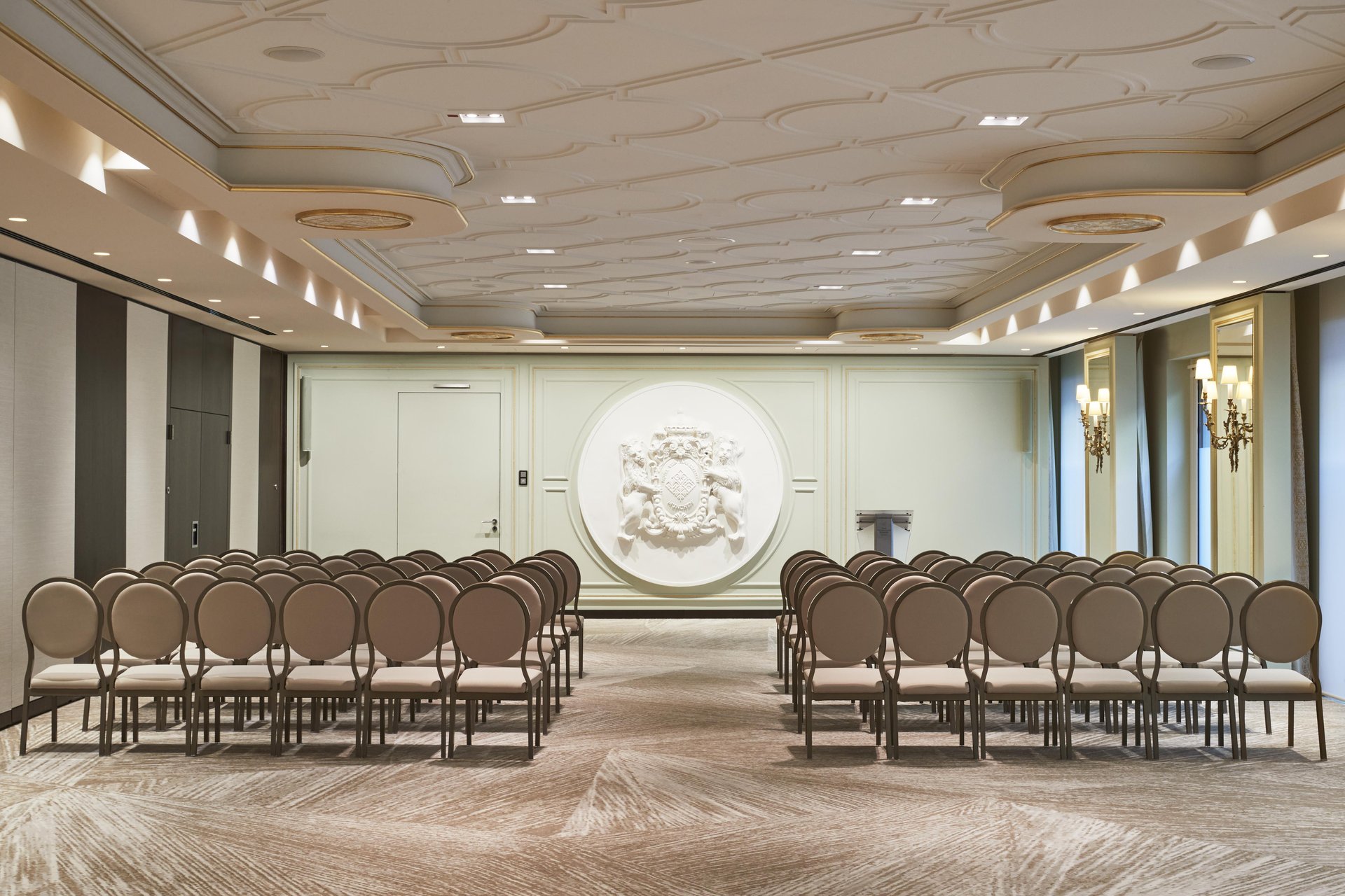 Maximilian I ornate conference hall with theater seating at Hotel Vier Jahreszeiten Kempinski München