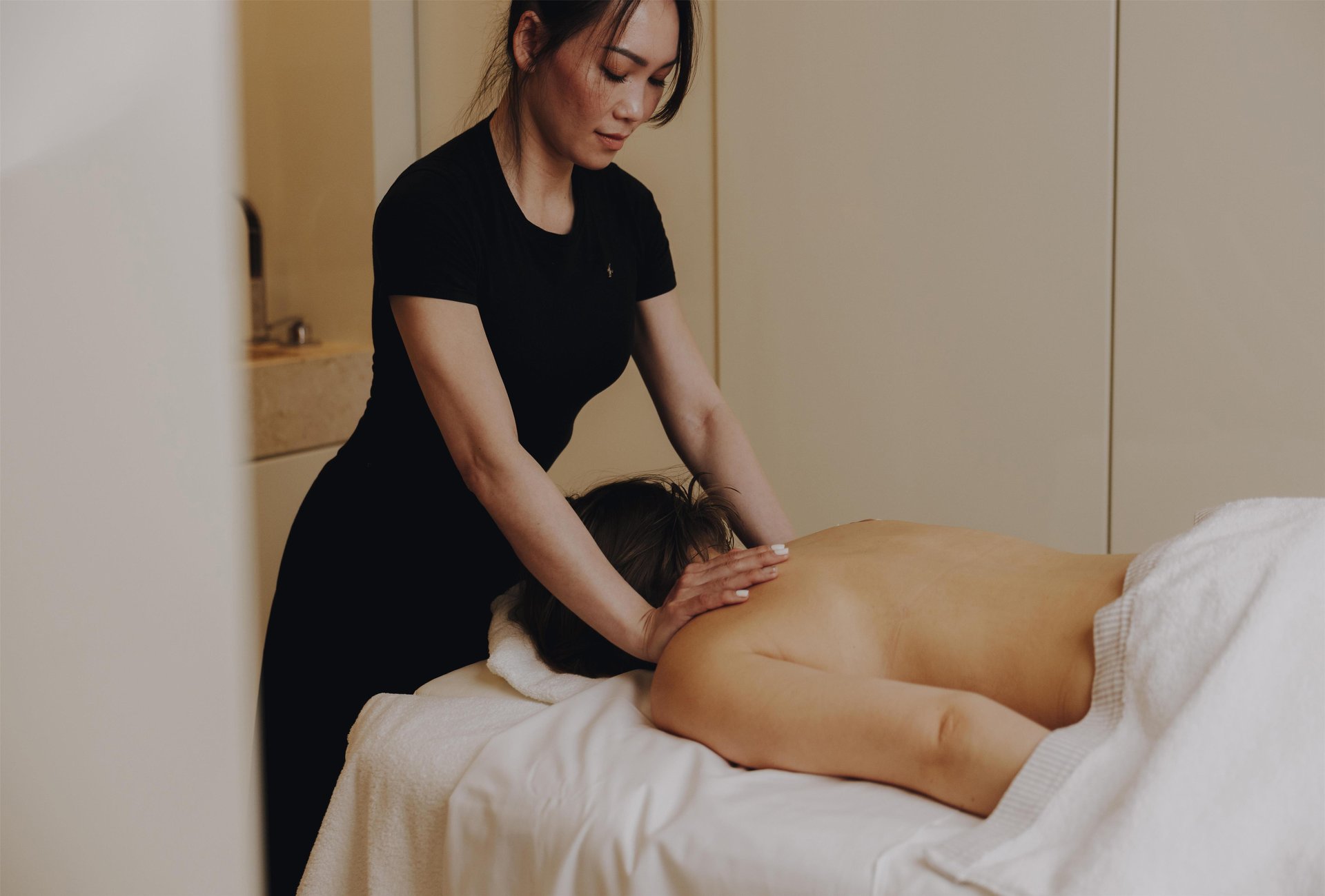 Back massage at Adlon Spa by Resense with female therapist