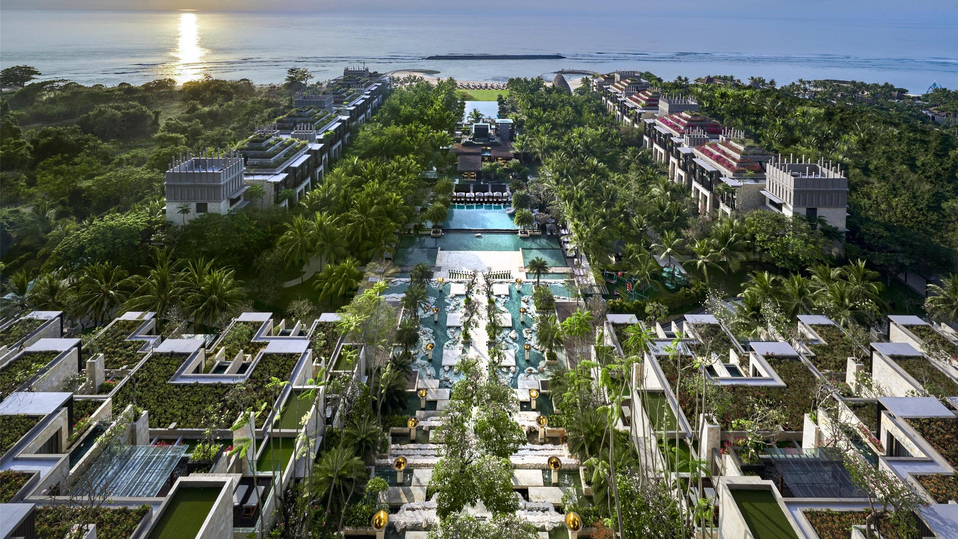 The Apurva Kempinski Bali luxury oceanfront resort in Nusa Dua with grand architecture, private pool villas, and panoramic sea views