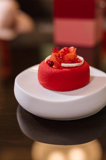 Lady in Red cake decorated with berries