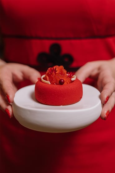 Lady in Red cake decorated with berries