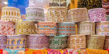caps worn by Omani men