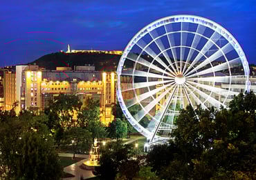 KIBUD_Exterior_with_Ferris_wheel.jpg