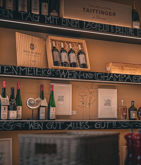 Selection of fine wine bottles and Taittinger Champagne at Kastenmeier's Wine and Champagne Bar in central Dresden