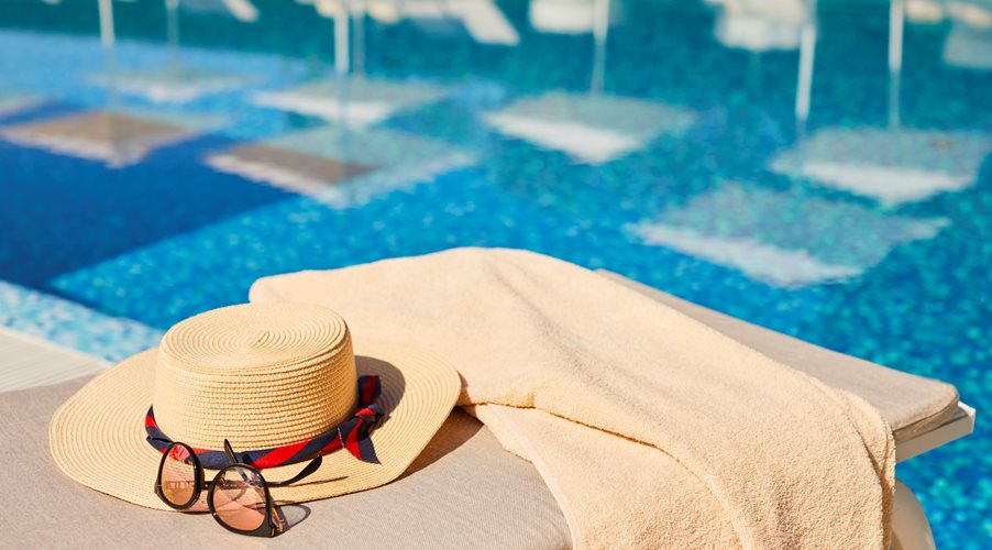 hat near pool
