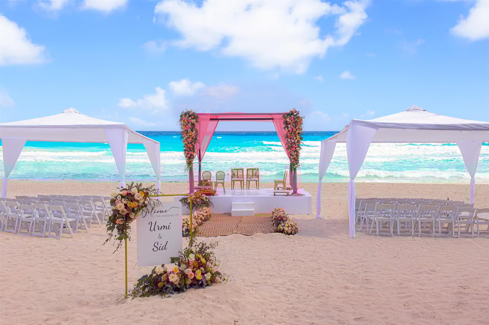Indian wedding on the beach with flowers